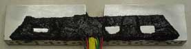 The sensors and wiring are sealed in black RTV